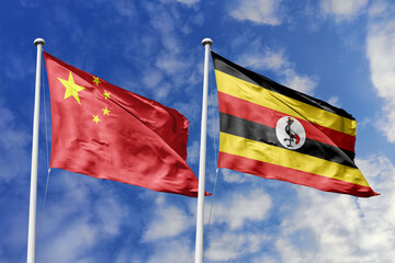 3d illustration. China and uganda Flag waving in sky. High detailed waving flag. 3D render. Waving...