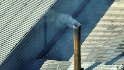 The drone's view exposes industrial estates emitting smoke, prompting us to address their...