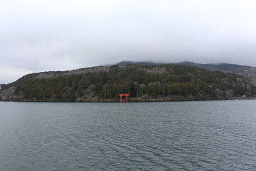 Traditional shrine gate near lake in japan