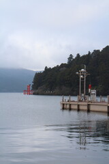 Traditional shrine gate near lake in japan