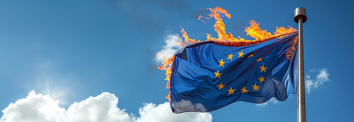 Flag of European Union on fire burning. The European Union suffers from a crisis, visualized by the European flag. Concept of crisis and war. Conflict