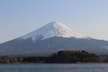 Mount Fuji with sunny blue sky and lake in Japan
