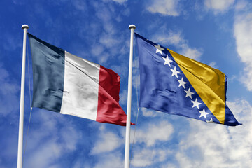 3d illustration. France and Bosnia and Herzegovina Flag waving in sky. High detailed waving flag. 3D render. Waving in sky. Flags fluttered in the cloudy sky.