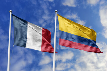 3d illustration. France and Colombia Flag waving in sky. High detailed waving flag. 3D render. Waving in sky. Flags fluttered in the cloudy sky.