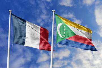3d illustration. France and Comoros Flag waving in sky. High detailed waving flag. 3D render....