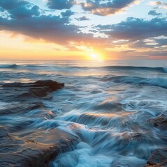 Naklejka premium Crashing waves at sunrise