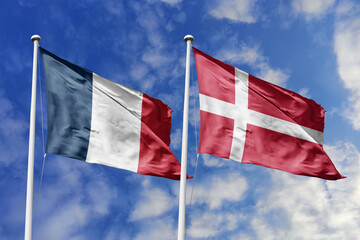3d illustration. France and Denmark Flag waving in sky. High detailed waving flag. 3D render. Waving in sky. Flags fluttered in the cloudy sky.