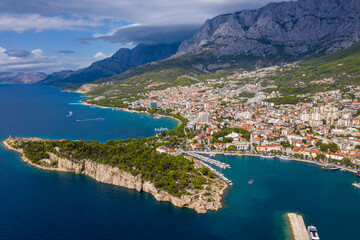 Aerial drone view . Beautiful coastline, clear sea from a bird's eye view of Dalmatia, Croatia. Makarska Riviera, famous and tourist place in Europ