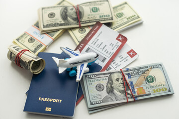Plane on dollar cash background, travel with airplane concept. - 796326927