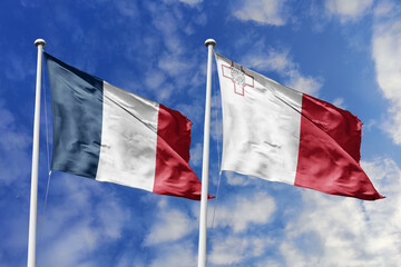 3d illustration. France and Malta Flag waving in sky. High detailed waving flag. 3D render. Waving in sky. Flags fluttered in the cloudy sky.