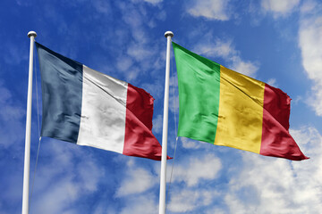 3d illustration. France and Mali Flag waving in sky. High detailed waving flag. 3D render. Waving in sky. Flags fluttered in the cloudy sky.