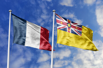 3d illustration. France and Niue Flag waving in sky. High detailed waving flag. 3D render. Waving in sky. Flags fluttered in the cloudy sky.