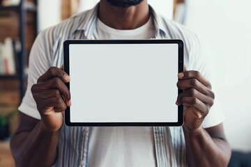 Device screen afro-american man in his 40s holding a tablet with a fully white screen