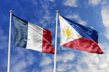 3d illustration. France and Philippines Flag waving in sky. High detailed waving flag. 3D render. Waving in sky. Flags fluttered in the cloudy sky.