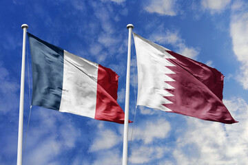 3d illustration. France and Qatar Flag waving in sky. High detailed waving flag. 3D render. Waving in sky. Flags fluttered in the cloudy sky.
