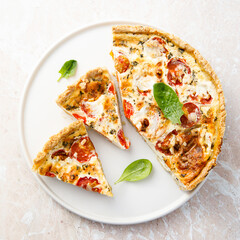 Homemade tomato quiche with basil
