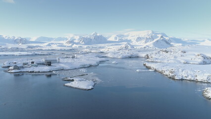 Arctic Polar Mountain Coast Aerial View. Snow Covered Antarctica Ocean Landscape Overview. North...