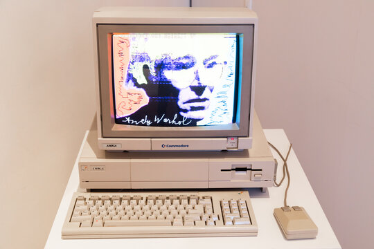 Computer Commodore Amiga 1000 with floppy disk and mouse