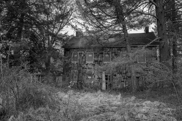 Abandoned farmhouse in the Delaware Water Gap  National Recreation Area in black and white