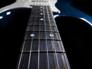 electric guitar fretboard neck perspective close up