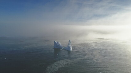 Antarctica Open Water Glacier Iceberg Tracking Aerial View flight. Ice Melt in Winter Ocean Surface...