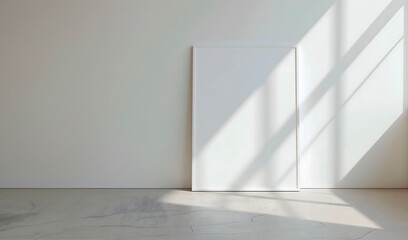 Front view of a white canvas frame in a minimalist room with soft pastel tones, offering a versatile template for showcasing digital artwork or product branding.