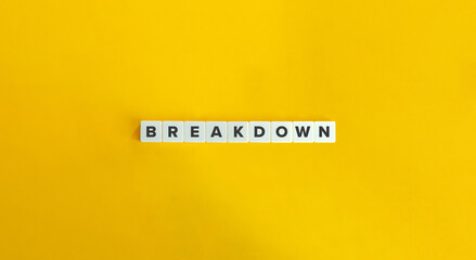 Breakdown Word. Text on Block Letter Tiles on Yellow Background. Minimalist Aesthetics.