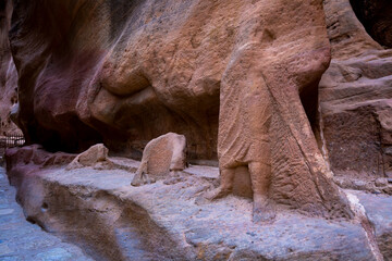 Statues carved in the stone in the archeological site of Petra in Jordan