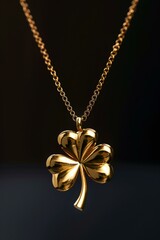 Gold four-leaf clover pendant on a gold chain