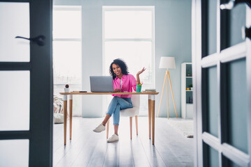 Full size photo of pretty young girl video call manager entrepreneur wear trendy pink outfit modern interior indoors office workstation