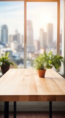 b'An empty wooden table with a small potted plant in the center and a large window in the background'