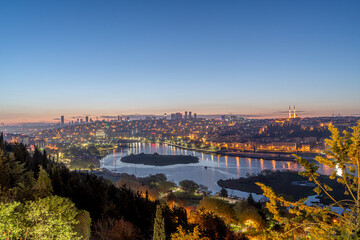 View of Istanbul from Pierre Loti Hill (Hill). Beautiful day cityscape with Golden Horn Bay, buildings and sky at sunrise time . Travel background for wallpaper or guidebook