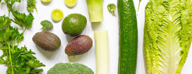 Green vegetable mix collection flat lay cover photo. Avocado, parsley, letuce, broccoli, cucumber...