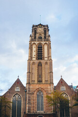 Rotterdam, South Holland, Netherlands - October 29, 2023, View of the Old Church Under a Cloudy Blue Sky