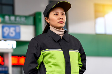 Portrait of an Asian female gas station employee