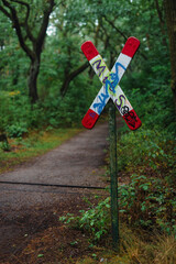 A railway crossing in the forest, St. Andrew's Cross in the forest