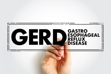 GERD - Gastroesophageal Reflux Disease acronym text stamp, medical concept background - 796518366