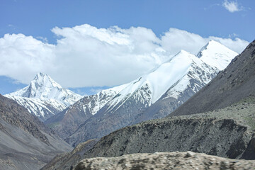 Alluring view of snow covered mountains located near Khunjerab Pass, Hunza Valley, Gilgit Baltistan