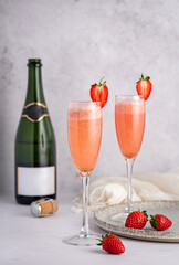 Drink photography of cocktail with  sparkling wine and strawberry, prosecco, cava, cheers, chardonnay, wedding, champagne,  beverage; celebration; party; event; glamour; alcohol