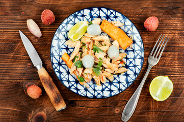 Salad with roasted chicken, lychee and lime.