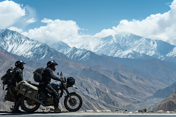 two young biker stop on the mountain