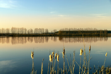 The sky and the lake are red-tinged during sunset
