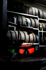 Garage. Car repair. Tools. Rubber tires, wheels.