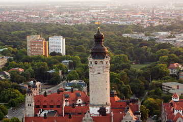 Aerial view of Leipzig with the spire of the 'Neue Rathaus', Saxony, Germany at sunset