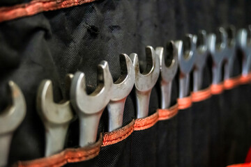 Garage. Car repair. Tools. Rubber tires, wheels.