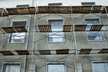 Scaffolding on the facade of a building under construction