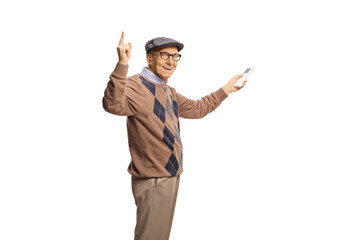 Elderly man holding a remote controller for AC unit and pointing up