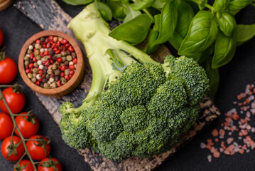 Fresh raw green broccoli in the form of a branch as an ingredient for cooking food at home