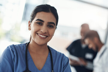Portrait, nurse and smile of woman in hospital for healthcare career, wellness and service. Face,...