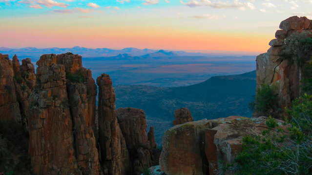 Dolomite columns, the Valley of Desolation and the Karoo plains at sunset from the Camdeboo National Park viewing point.